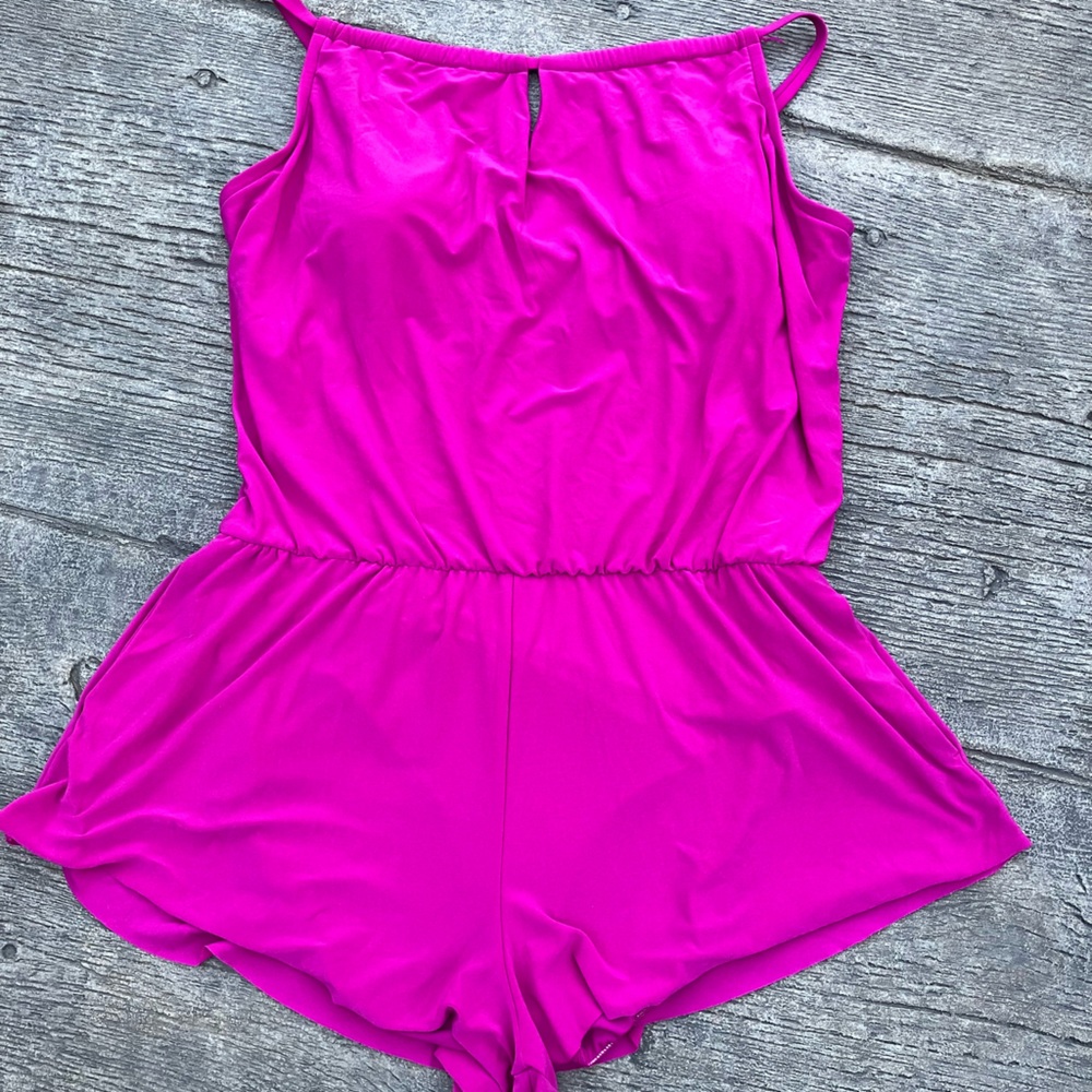 Pink Jumpsuit with Relaxed Fit and Elastic Waistband and lining.